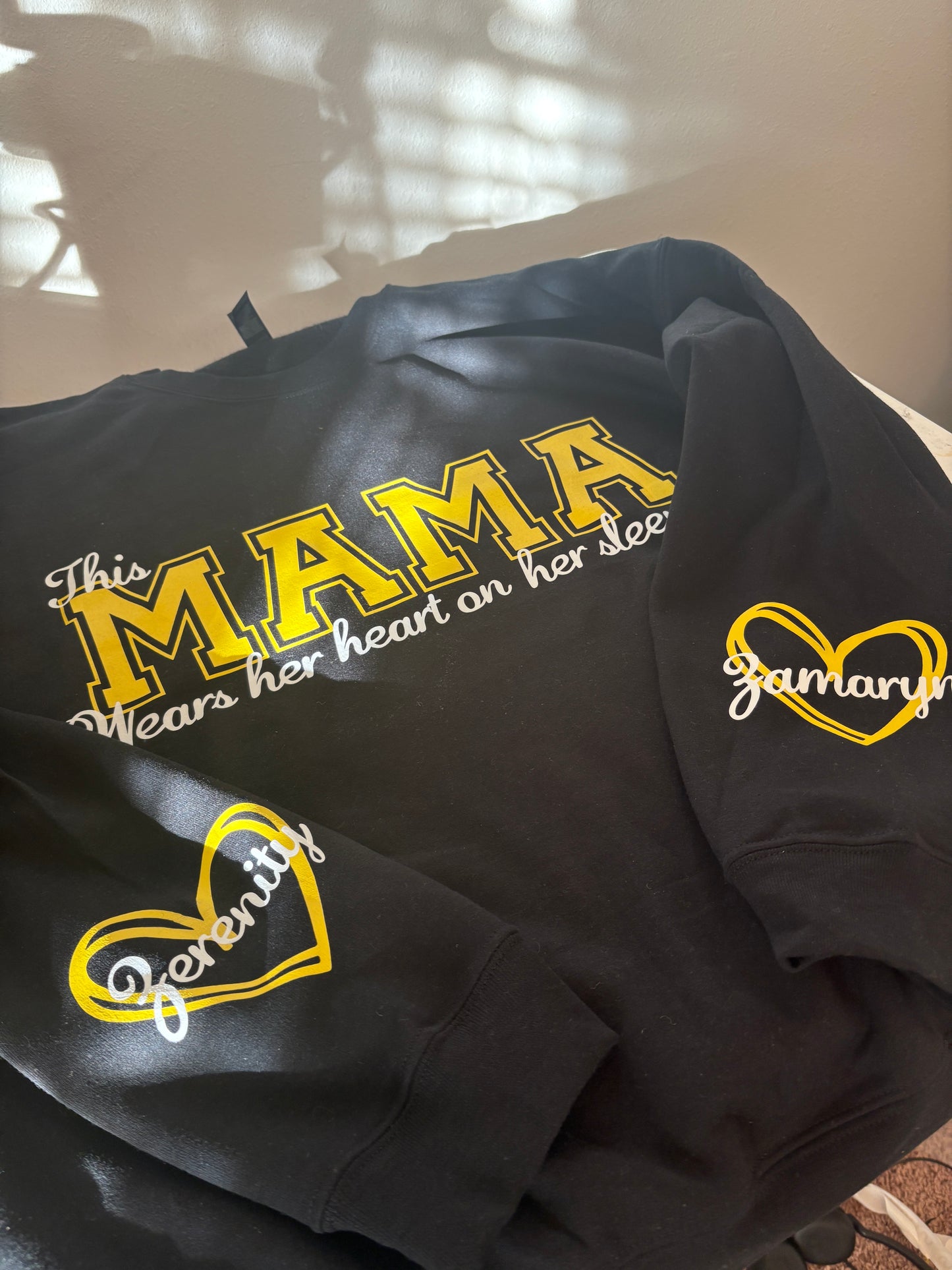 Customized “This Mama Wears her heart on her sleeve” crew neck.