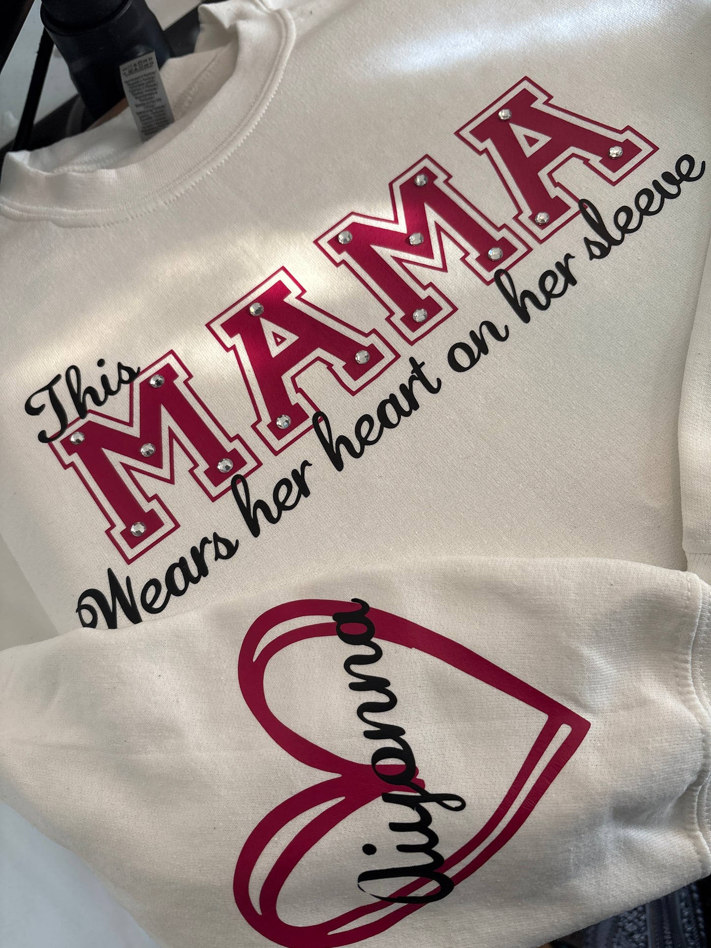 Customized “This Mama Wears her heart on her sleeve” crew neck.