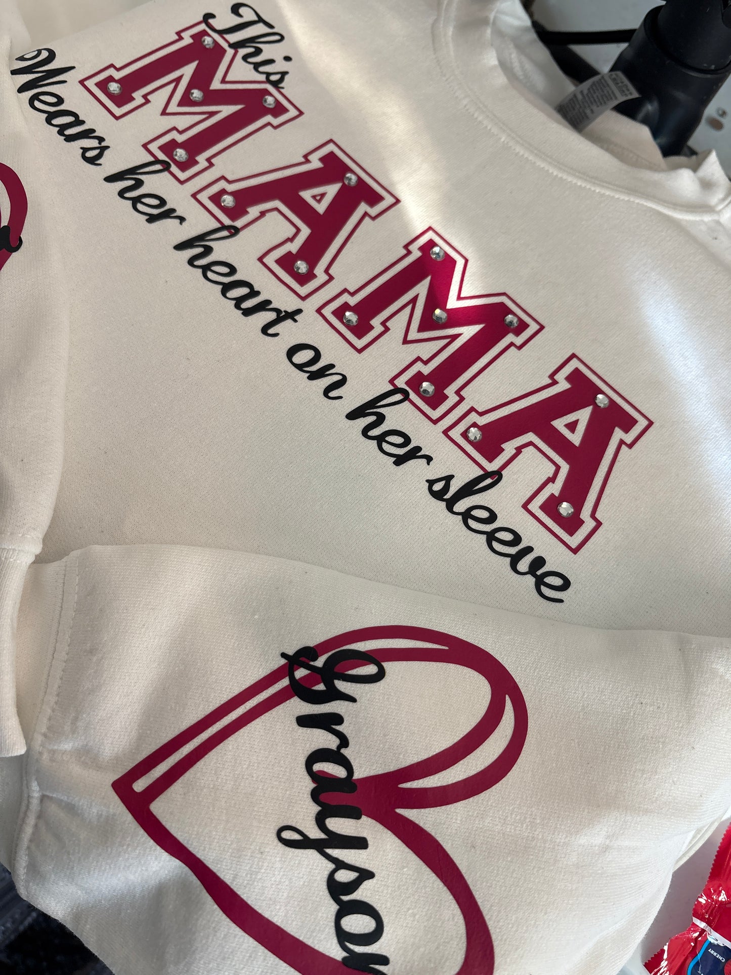 Customized “This Mama Wears her heart on her sleeve” crew neck.